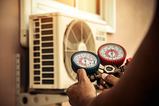 Professional Hvac technician working in Tuttle, OK
